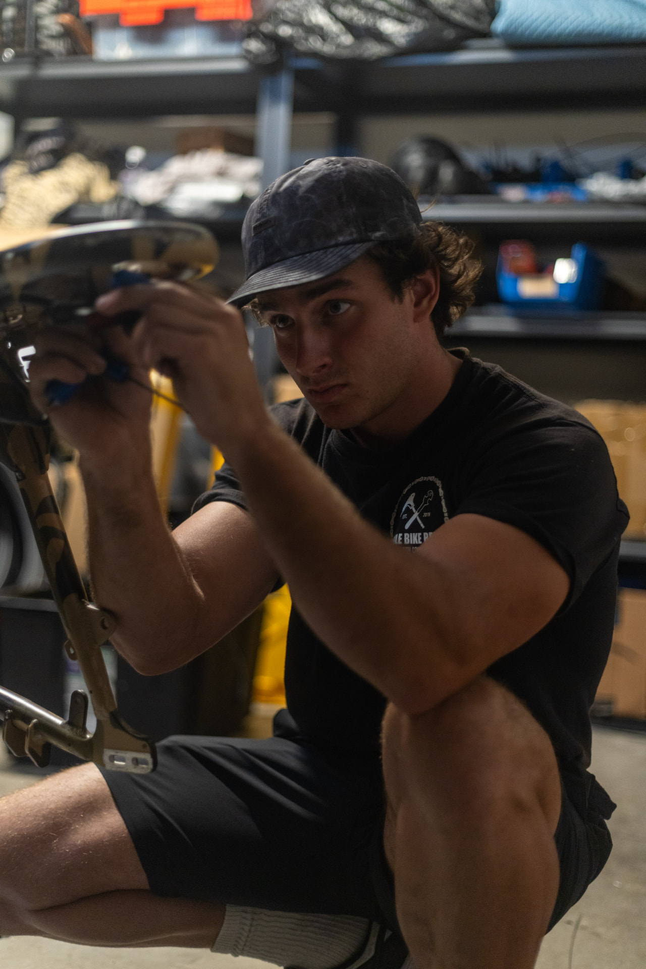 Mobile mechanic servicing an e-bike in a mobile workshop